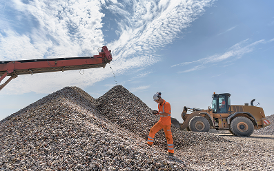 construction worker with vehicles